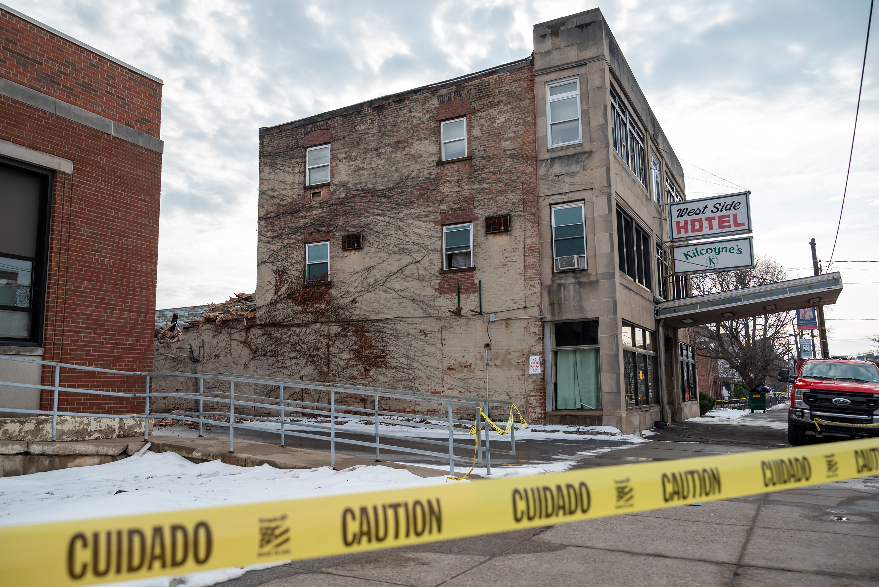 Caution tape surrounds the West Scranton Hotel on 129 S....