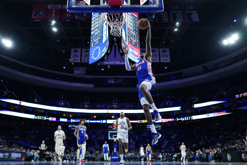 Philadelphia 76ers' Justin Edwards goes up for a shot during the second half of an NBA basketball game against the Cleveland Cavaliers Wednesday, Jan. 14, 2026, in Philadelphia. 