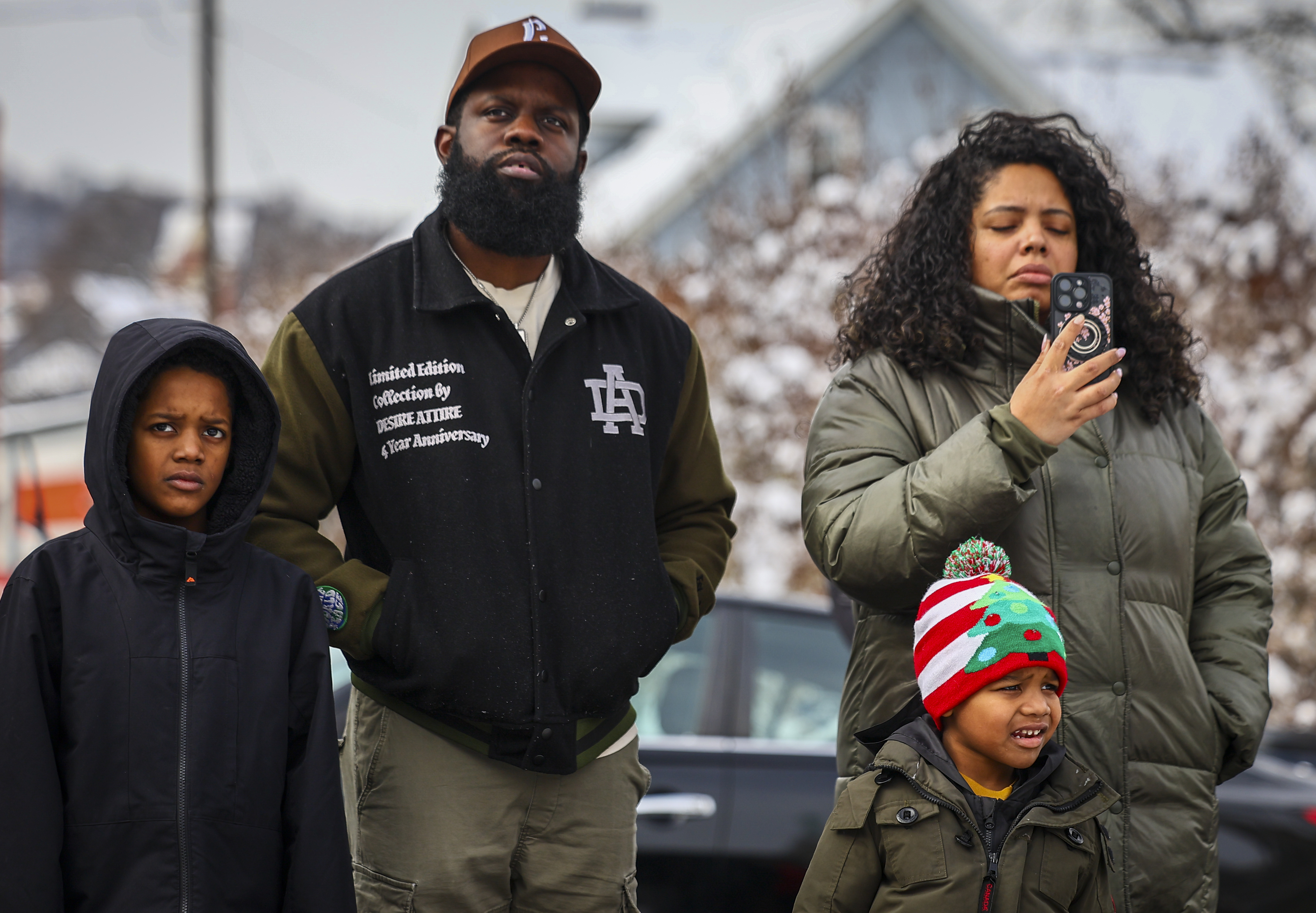 Larnelle Damon Sr. and his wife, Soilymar attend the A Civil Rights Movement March honors Dr. Martin Luther King Jr. on Monday, Jan. 19, 2025, with their sons, Larnelle Jr., 8, and Latrelle, 4. 