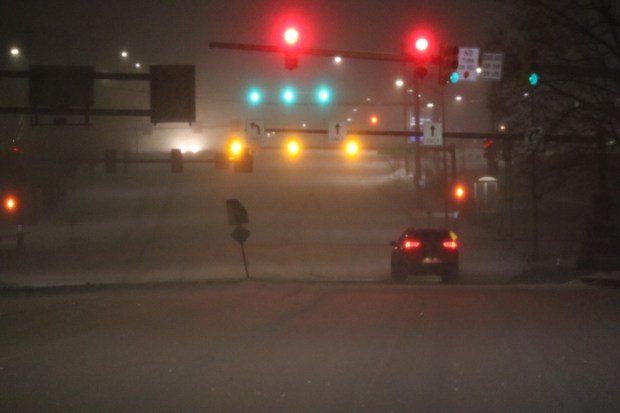 Snow falls early Sunday, Jan. 25, 2026, on Eighth Avenue in Bethlehem as a major snowstorm moved into the area. (Rich Rolen/Special to The Morning Call)
