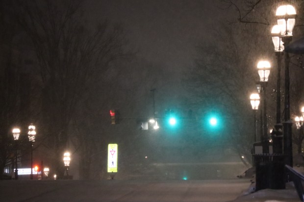 Snow falls early Sunday, Jan. 25, 2026, on Main Street in Bethlehem as a major snowstorm moved into the area. (Rich Rolen/Special to The Morning Call)
