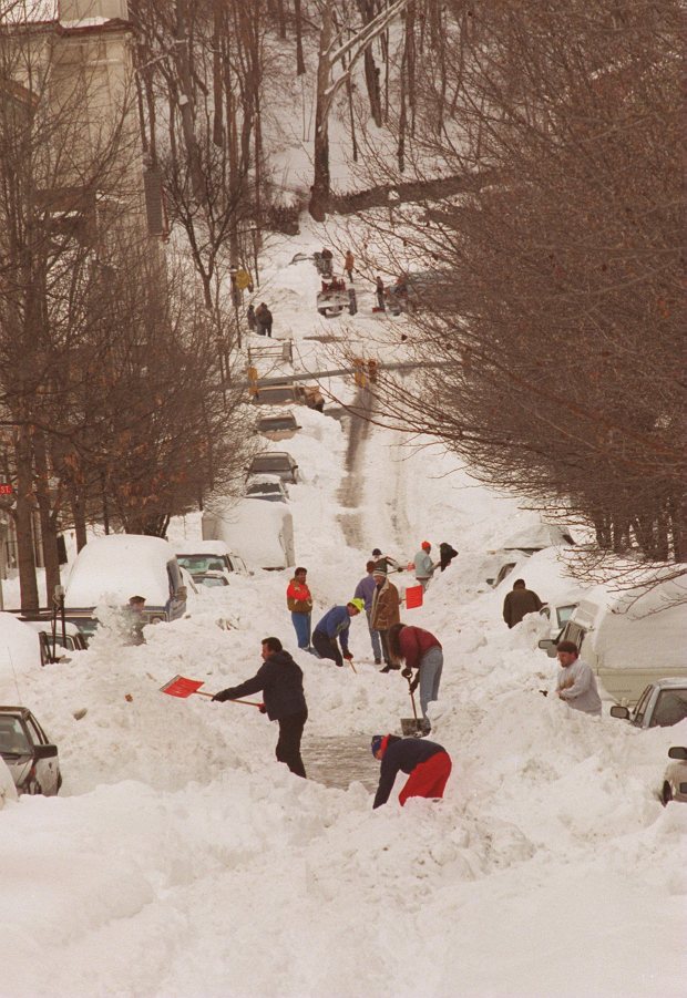 Residents of South Fifth Street in Easton take to clearing off the roadway themselves after city plows did not open the roadway after the blizzard of 1996, Jan. 9, 1996. (Pete Shaheen/The Morning Call)