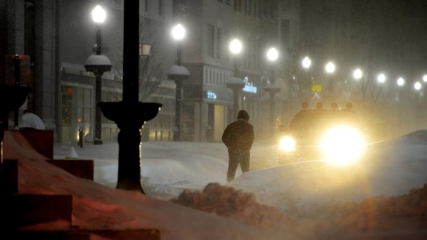 On Hamilton Street in downtown Allentown, night falls and snow drifts steadily get bigger during the Blizzard of 2016 on Saturday, Jan. 23, 2026. (April Bartholomew/The Morning Call)