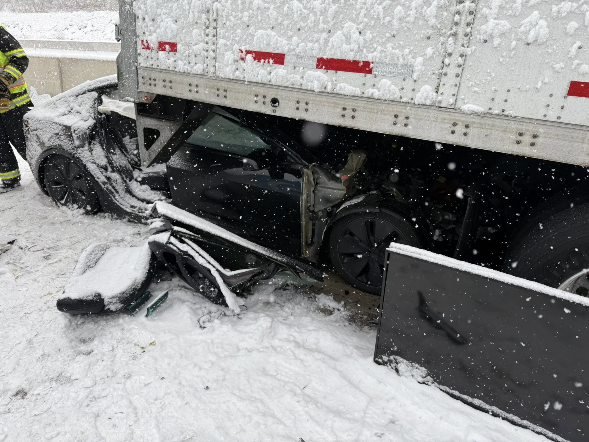 The wreckage of a 12-vehicle crash is seen Saturday, Jan....