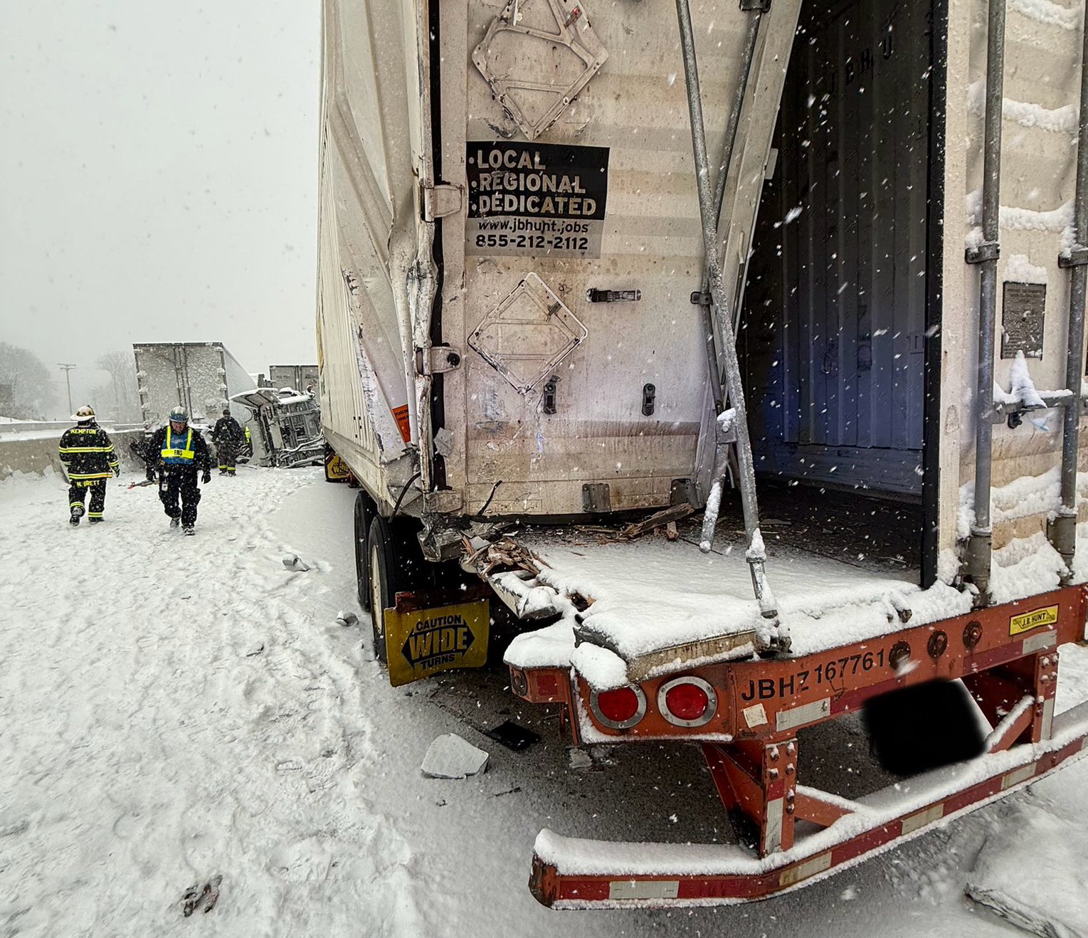 The wreckage of a 12-vehicle crash is seen Saturday, Jan....