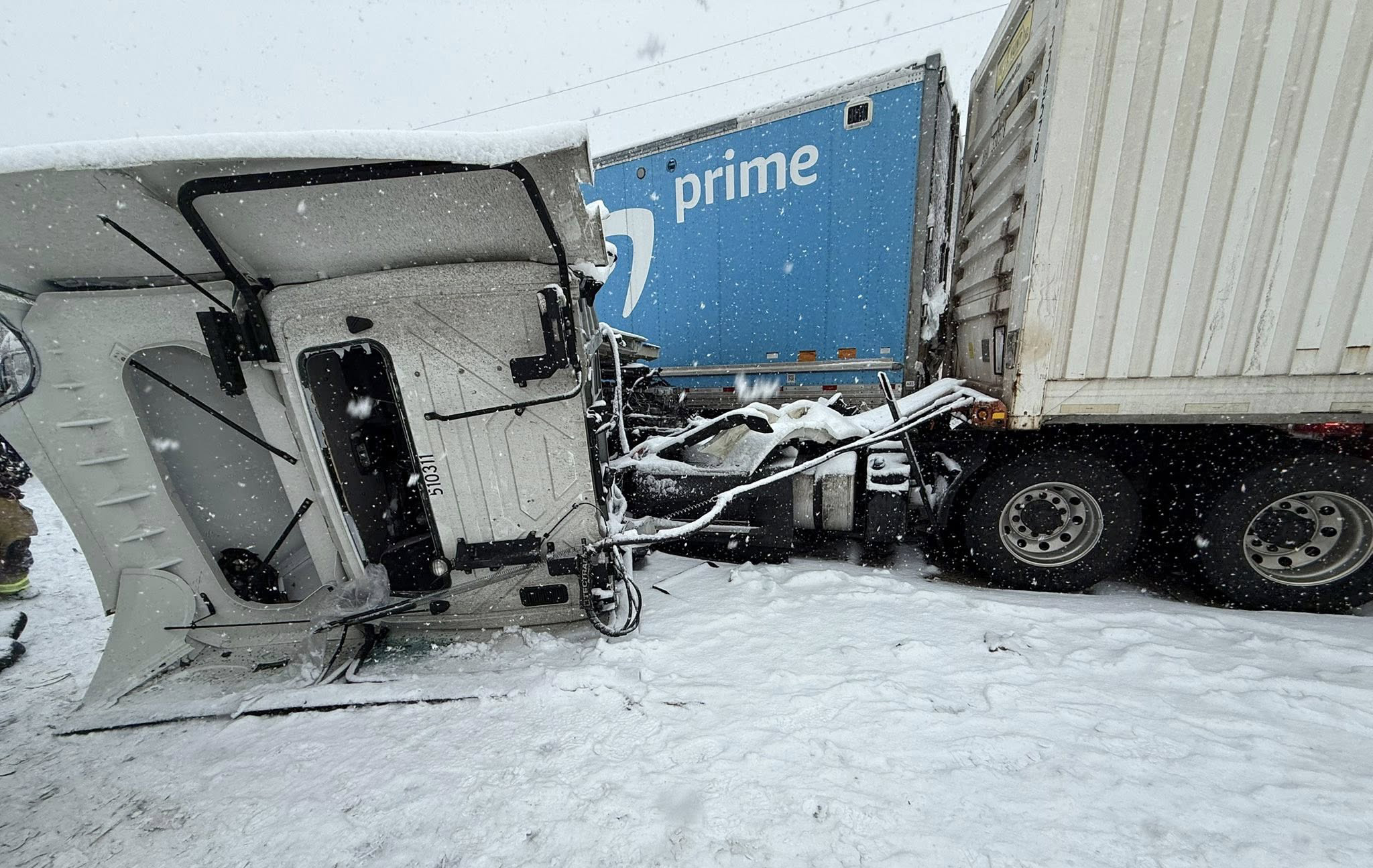 The wreckage of an 11-vehicle crash is seen Saturday, Jan....