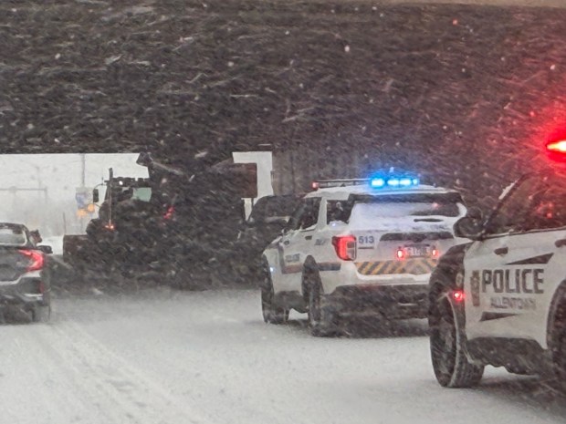 A tri-axle is wedged under the Interstate 78 overpass on Lehigh Street in Allentown on Sunday, Jan. 25, 2026, as a major snowstorm moved into the area. (Rich Rolen/Special to The Morning Call)