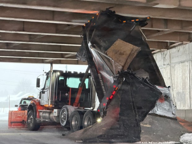 A tri-axle is wedged under the Interstate 78 overpass on Lehigh Street in Allentown on Sunday, Jan. 25, 2026, as a major snowstorm moved into the area. (Rich Rolen/Special to The Morning Call)