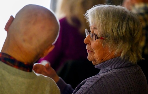 Jeanette Fry talks about fond memories of Stern's Market on Tuesday, Jan. 13, 2026, during Movies at the Mill at The Tavern Room in Hellertown. Six videos featuring historic locations in Hellertown, made with a donation from the Martin Guitar Foundation, also included ones about the Clock Tower and The Sauconia/The Movies. A second set of six videos will debut at 6:30 p.m. Feb. 2 and 1 p.m. Feb. 3. (April Gamiz/The Morning Call)