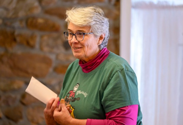 Vivian Demko, member of the Hellertown Historical Society, introduces videos featuring historic locations in Hellertown on Tuesday, Jan. 13, 2026, during Movies at the Mill at The Tavern Room in Hellertown. The six videos, made with a donation from the Martin Guitar Foundation, included ones about the Clock Tower, Stern's Market and The Sauconia/The Movies. A second set of six videos will debut at 6:30 p.m. Feb. 2 and 1 p.m. Feb. 3. (April Gamiz/The Morning Call)