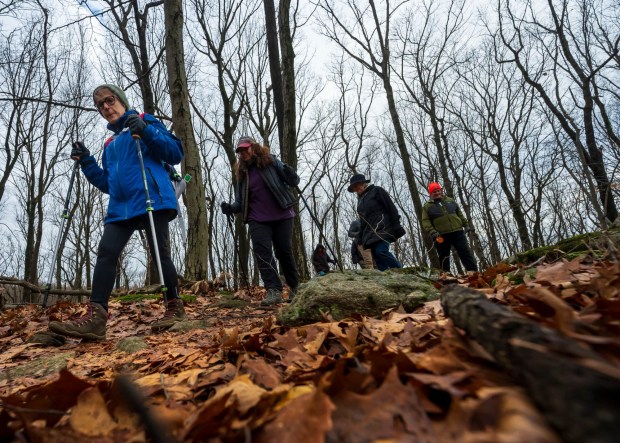 Eileen Lederman of Allentown hikes on the Horizon Trail during a Wildlands Conservancy First Day Hike on New Year's Day, Wednesday, Jan. 1, 2025, at the Wildlands Conservancy's new 187-acre Black River Sanctuary preserve on top of South Mountain in Salisbury and Upper Saucon townships. (April Gamiz/The Morning Call)
