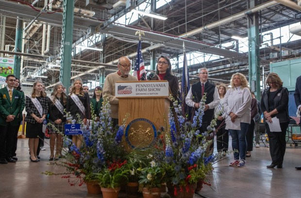 Jim Victor and Marie Pelton, Butter Sculpture creators joined Agriculture Secretary Russell Redding on Thursday, Jan. 8, 2026, to unveil the 2026 Pennsylvania Farm Show Butter Sculpture, a 1,000-pound sculpture that illustrates how defining moments in U.S. history and the evolution of agriculture have grown side by side to shape our nation. This year's sculpture is titled, "A Toast to Our Nation's 250th Anniversary: Inspired by Founders. Grown by Farmers." Created for America's 250th anniversary, this year's butter sculpture honors Pennsylvania's pivotal role in the nation's founding and the growth of American agriculture and our nation's economy. Set in 1776 Philadelphia, the sculpture depicts Benjamin Franklin and the Founding Fathers at the signing of the Declaration of Independence, complete with a celebratory toast with milk. Patriotic elements, including the Liberty Bell, a tribute to Betsy Ross, and red, white, and blue accents underscore the spirit of the semi-quincentennial. At the same time, the base highlights Pennsylvania's enduring agricultural heritage. (Commonwealth Media Services)