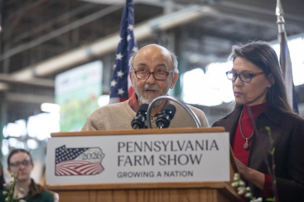 Jim Victor and Marie Pelton, Butter Sculpture creators joined Agriculture Secretary Russell Redding on Thursday, Jan. 8, 2026, to unveil the 2026 Pennsylvania Farm Show Butter Sculpture, a 1,000-pound sculpture that illustrates how defining moments in U.S. history and the evolution of agriculture have grown side by side to shape our nation. This year's sculpture is titled, "A Toast to Our Nation's 250th Anniversary: Inspired by Founders. Grown by Farmers." Created for America's 250th anniversary, this year's butter sculpture honors Pennsylvania's pivotal role in the nation's founding and the growth of American agriculture and our nation's economy. Set in 1776 Philadelphia, the sculpture depicts Benjamin Franklin and the Founding Fathers at the signing of the Declaration of Independence, complete with a celebratory toast with milk. Patriotic elements, including the Liberty Bell, a tribute to Betsy Ross, and red, white, and blue accents underscore the spirit of the semi-quincentennial. At the same time, the base highlights Pennsylvania's enduring agricultural heritage. (Commonwealth Media Services)