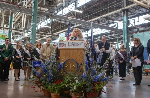 Cassandra Coleman, PA America250 joined Agriculture Secretary Russell Redding on Thursday, Jan. 8, 2026, to unveil the 2026 Pennsylvania Farm Show Butter Sculpture, a 1,000-pound sculpture that illustrates how defining moments in U.S. history and the evolution of agriculture have grown side by side to shape our nation. This year's sculpture is titled, "A Toast to Our Nation's 250th Anniversary: Inspired by Founders. Grown by Farmers." Created for America's 250th anniversary, this year's butter sculpture honors Pennsylvania's pivotal role in the nation's founding and the growth of American agriculture and our nation's economy. Set in 1776 Philadelphia, the sculpture depicts Benjamin Franklin and the Founding Fathers at the signing of the Declaration of Independence, complete with a celebratory toast with milk. Patriotic elements, including the Liberty Bell, a tribute to Betsy Ross, and red, white, and blue accents underscore the spirit of the semi-quincentennial. At the same time, the base highlights Pennsylvania's enduring agricultural heritage. (Commonwealth Media Services)