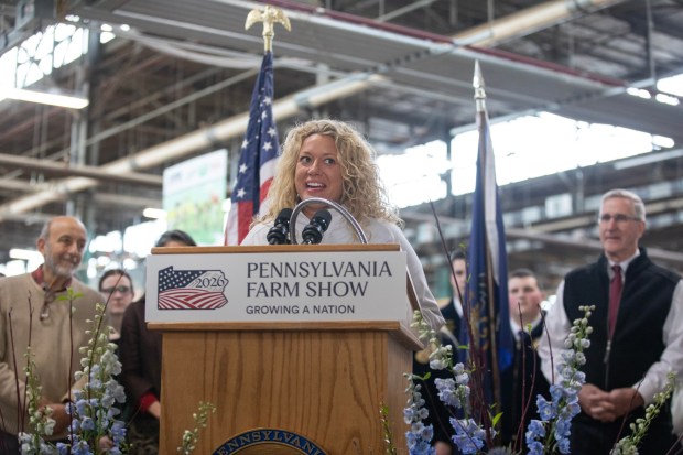 Cassandra Coleman, PA America250 joined Agriculture Secretary Russell Redding on Thursday, Jan. 8, 2026, to unveil the 2026 Pennsylvania Farm Show Butter Sculpture, a 1,000-pound sculpture that illustrates how defining moments in U.S. history and the evolution of agriculture have grown side by side to shape our nation. This year's sculpture is titled, "A Toast to Our Nation's 250th Anniversary: Inspired by Founders. Grown by Farmers." Created for America's 250th anniversary, this year's butter sculpture honors Pennsylvania's pivotal role in the nation's founding and the growth of American agriculture and our nation's economy. Set in 1776 Philadelphia, the sculpture depicts Benjamin Franklin and the Founding Fathers at the signing of the Declaration of Independence, complete with a celebratory toast with milk. Patriotic elements, including the Liberty Bell, a tribute to Betsy Ross, and red, white, and blue accents underscore the spirit of the semi-quincentennial. At the same time, the base highlights Pennsylvania's enduring agricultural heritage. (Commonwealth Media Services)