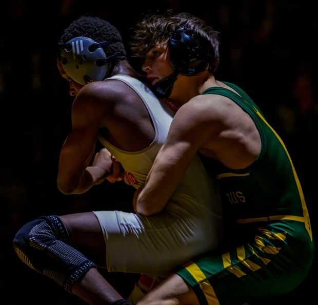 Emmaus' Emillo Albanese wrestles Parkland's Ricardo Rivera in the 133-pound weight class Thursday, Jan. 22, 2026, at Emmaus High School. (April Gamiz/The Morning Call)