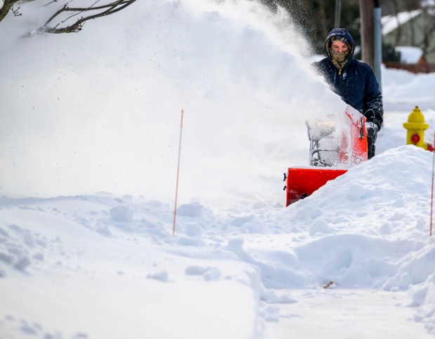 Valley Land Works employee Eric Gustofson plows sidewalks Monday, Jan. 26, 2026, in Bethlehem after Sunday's storm that dropped more than a foot of snow in some parts of the Lehigh Valley. (April Gamiz/The Morning Call)
