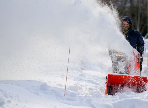 Valley Land Works employee Eric Gustofson plows sidewalks Monday, Jan. 26, 2026, in Bethlehem after Sunday's storm that dropped more than a foot of snow in some parts of the Lehigh Valley. (April Gamiz/The Morning Call)