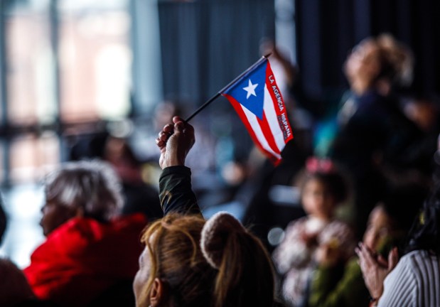 A Puerto Rican flag is waved during the 14th annual Three Kings Celebration on Sunday, Jan. 4, 2026, at SteelStacks in Bethlehem. (Jane Therese/Special to The Morning Call)
