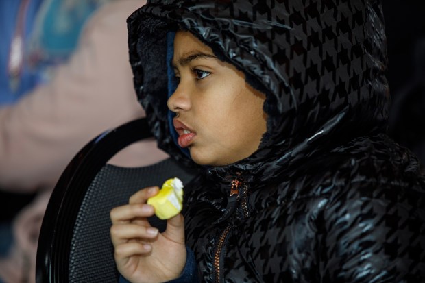 Kilie Duran, 8, of Bethlehem listens to music during the 14th annual Three Kings Celebration on Sunday, Jan. 4, 2026, at SteelStacks in Bethlehem. (Jane Therese/Special to The Morning Call)