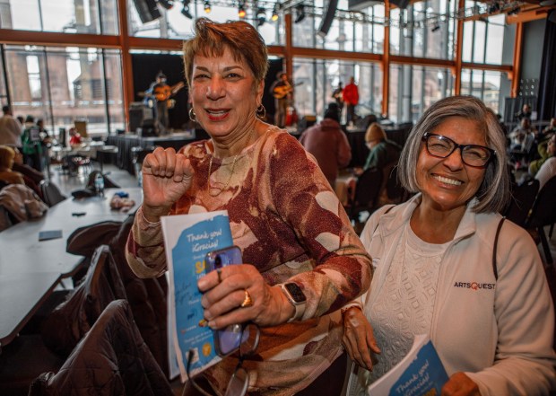 Mirna Rivera, chair of the Latin Programming at ArtsQuest, and volunteer Rosa Velasquez enjoy themselves during the 14th annual Three Kings Celebration on Sunday, Jan. 4, 2026, at SteelStacks in Bethlehem. (Jane Therese/Special to The Morning Call)