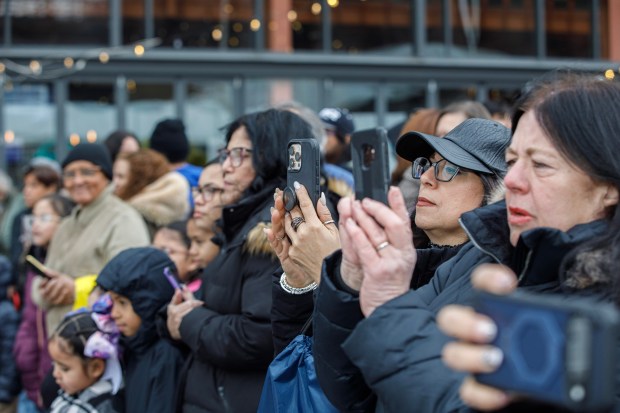 People take photos of the arrival of the Three Kings during the 14th annual Three Kings Celebration on Sunday, Jan. 4, 2026, at SteelStacks in Bethlehem. (Jane Therese/Special to The Morning Call)