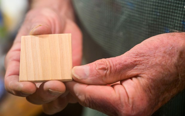 An unpainted art tile Tuesday, Jan. 6, 2026, created by Dave Jacoby of Bethlehem Township as part of an idea he had years ago that he calls WOA! (World of art!). Jacoby leaves the tiles in various place to cheer up people at a time when there is fear, anger and sadness in the world. He started a Facebook page and gives the tiles to people, asking them to spread the art and upload a photo and a post about where it was placed. (April Gamiz / The Morning Call)