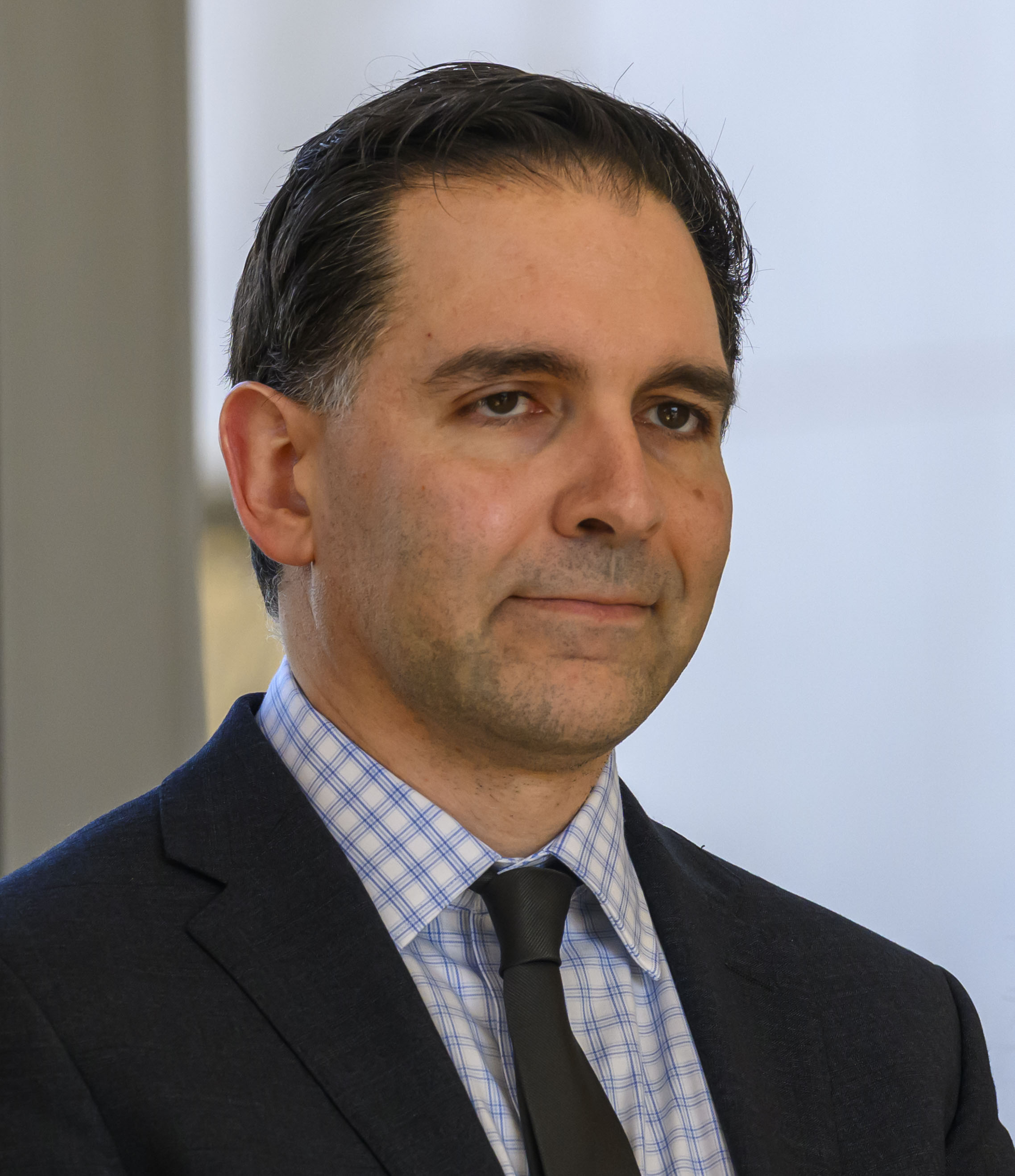 Michael Emili is reappointed as director of public works by...