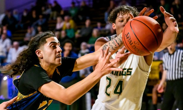 Allentown Central Catholic's Jahrel Vigo looks to stop Executive Education's Eshaan Tung during a boys basketball game Saturday, Jan. 18, 2025, at Allentown Central Catholic. (April Gamiz/The Morning Call)