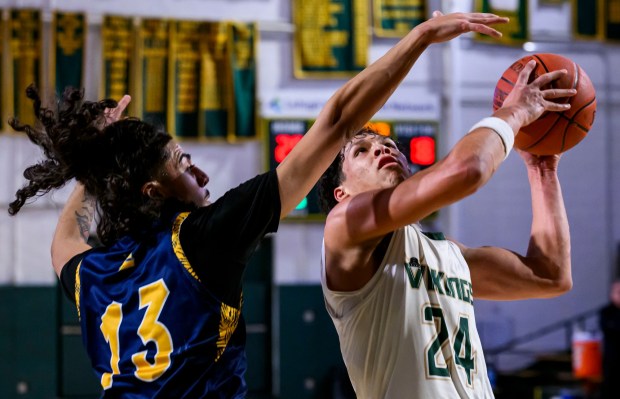 Allentown Central Catholic's Jahrel Vigo looks to score against Executive Education's Eshaan Tung during a boys basketball game Saturday, Jan. 18, 2025, at Allentown Central Catholic. (April Gamiz/The Morning Call)