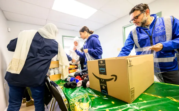 Ahmad Chaudhry, president of the Ahmadiyya Muslim Community's Lehigh Valley chapter, and other chapter members pack essential supply kits for individuals experiencing homelessness Sunday, Jan. 11, 2026, at Baitul Ata Mosque in Salisbury Township. The effort is part of the community's ongoing commitment to its guiding principle, "Love for All, Hatred for None," which includes regular blood drives, food drives and programs to feed the hungry throughout the year. (April Gamiz/The Morning Call)