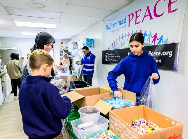 Noor Chaudhry and other members of the Ahmadiyya Muslim Community's Lehigh Valley chapter gather to pack essential supply kits for individuals experiencing homelessness Sunday, Jan. 11, 2026, at Baitul Ata Mosque in Salisbury Township. The effort is part of the community's ongoing commitment to its guiding principle, "Love for All, Hatred for None," which includes regular blood drives, food drives and programs to feed the hungry throughout the year. (April Gamiz/The Morning Call)