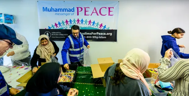 Members of the Ahmadiyya Muslim Community's Lehigh Valley chapter gather to pack essential supply kits for individuals experiencing homelessness Sunday, Jan. 11, 2026, at Baitul Ata Mosque in Salisbury Township. The effort is part of the community's ongoing commitment to its guiding principle, "Love for All, Hatred for None," which includes regular blood drives, food drives and programs to feed the hungry throughout the year. (April Gamiz/The Morning Call)