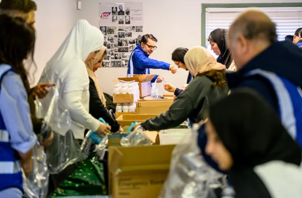 Members of the Ahmadiyya Muslim Community's Lehigh Valley chapter gather to pack essential supply kits for individuals experiencing homelessness Sunday, Jan. 11, 2026, at Baitul Ata Mosque in Salisbury Township. The effort is part of the community's ongoing commitment to its guiding principle, "Love for All, Hatred for None," which includes regular blood drives, food drives and programs to feed the hungry throughout the year. (April Gamiz/The Morning Call)