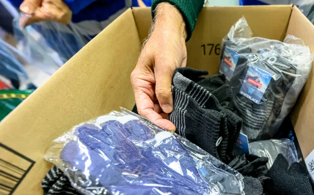 Members of the Ahmadiyya Muslim Community's Lehigh Valley chapter gather to pack essential supply kits for individuals experiencing homelessness Sunday, Jan. 11, 2026, at Baitul Ata Mosque in Salisbury Township. The effort is part of the community's ongoing commitment to its guiding principle, "Love for All, Hatred for None," which includes regular blood drives, food drives and programs to feed the hungry throughout the year. (April Gamiz/The Morning Call)