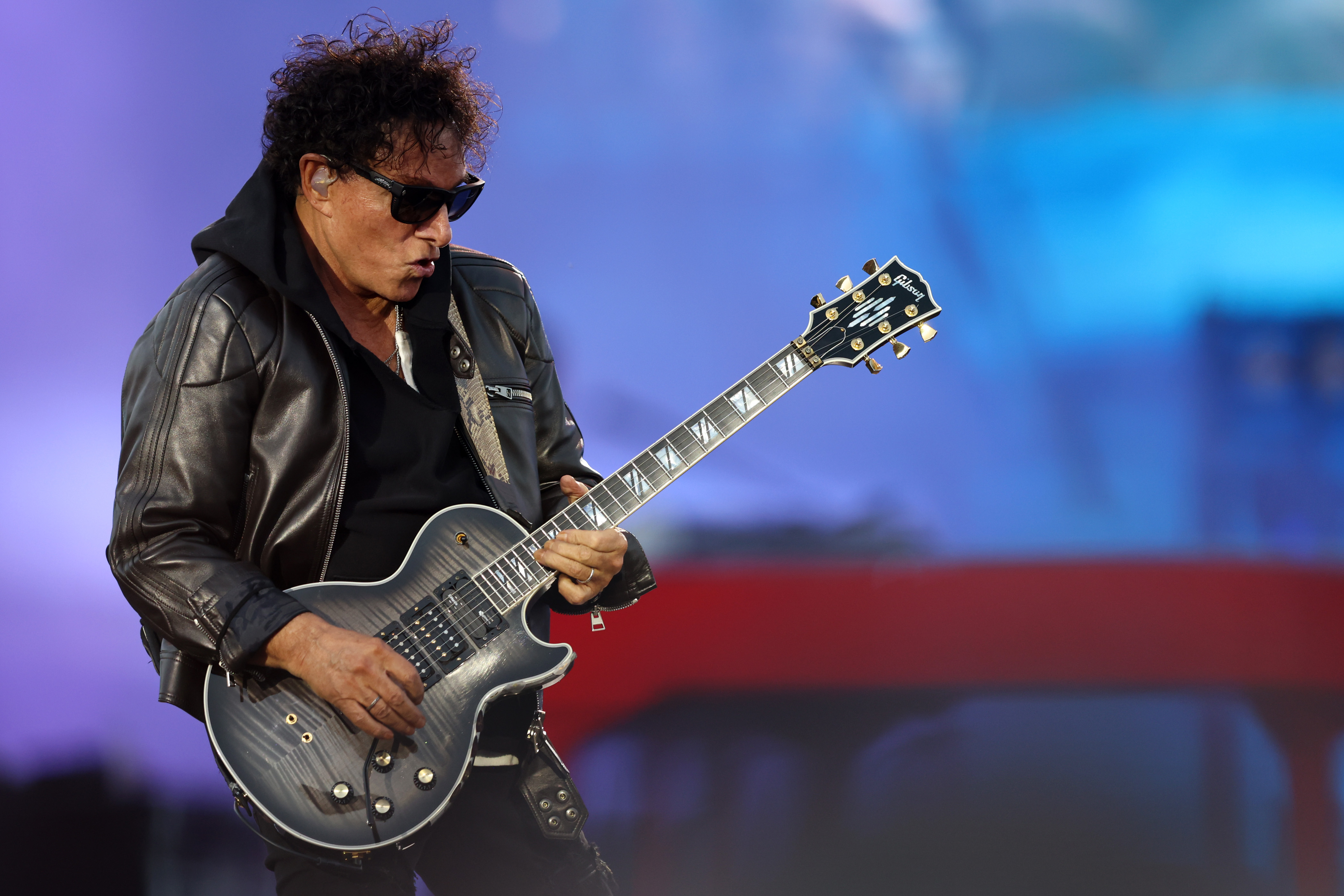 Journey lead guitarist Neal Schon performs in concert at Oracle...