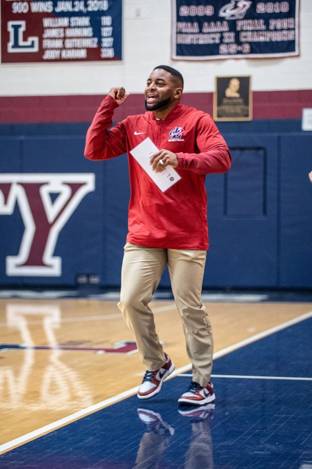 Liberty coach Nigel Long coaches his team during an EPC game against Pocono Mountain West on Thursday, Dec. 18, 2025, at Liberty High School in Bethlehem. (Jonathan Broady/Special to The Morning Call)