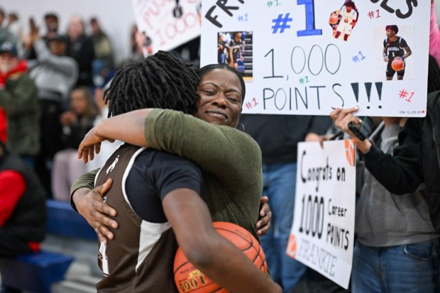 Catasauqua's Frankie Pujols and his mother Olivia celebrate his one thousandth point against Pleasant Valley during an Eastern Pennsylvania Conference boys basketball game on Monday, Dec. 29, 2025, at Northern Lehigh High School in Slatington. (Jonathan Broady/Special to The Morning Call)