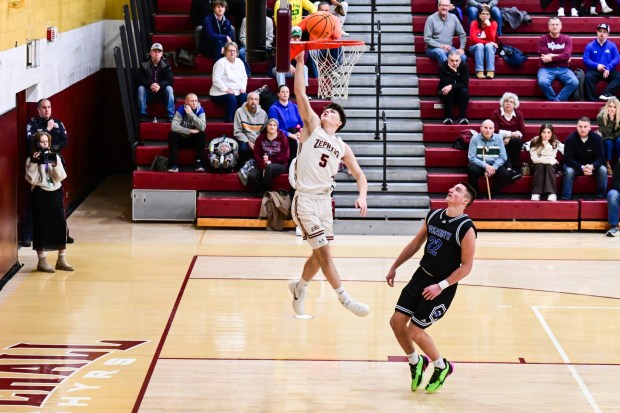 Whitehall's Seth Hoderewski makes a layup against Nazareth in the boys basketball Whitehall Christmas Tournament championship game Tuesday, Dec. 30, 2025, at Whitehall High School. (Jonathan Broady/Special to The Morning Call)