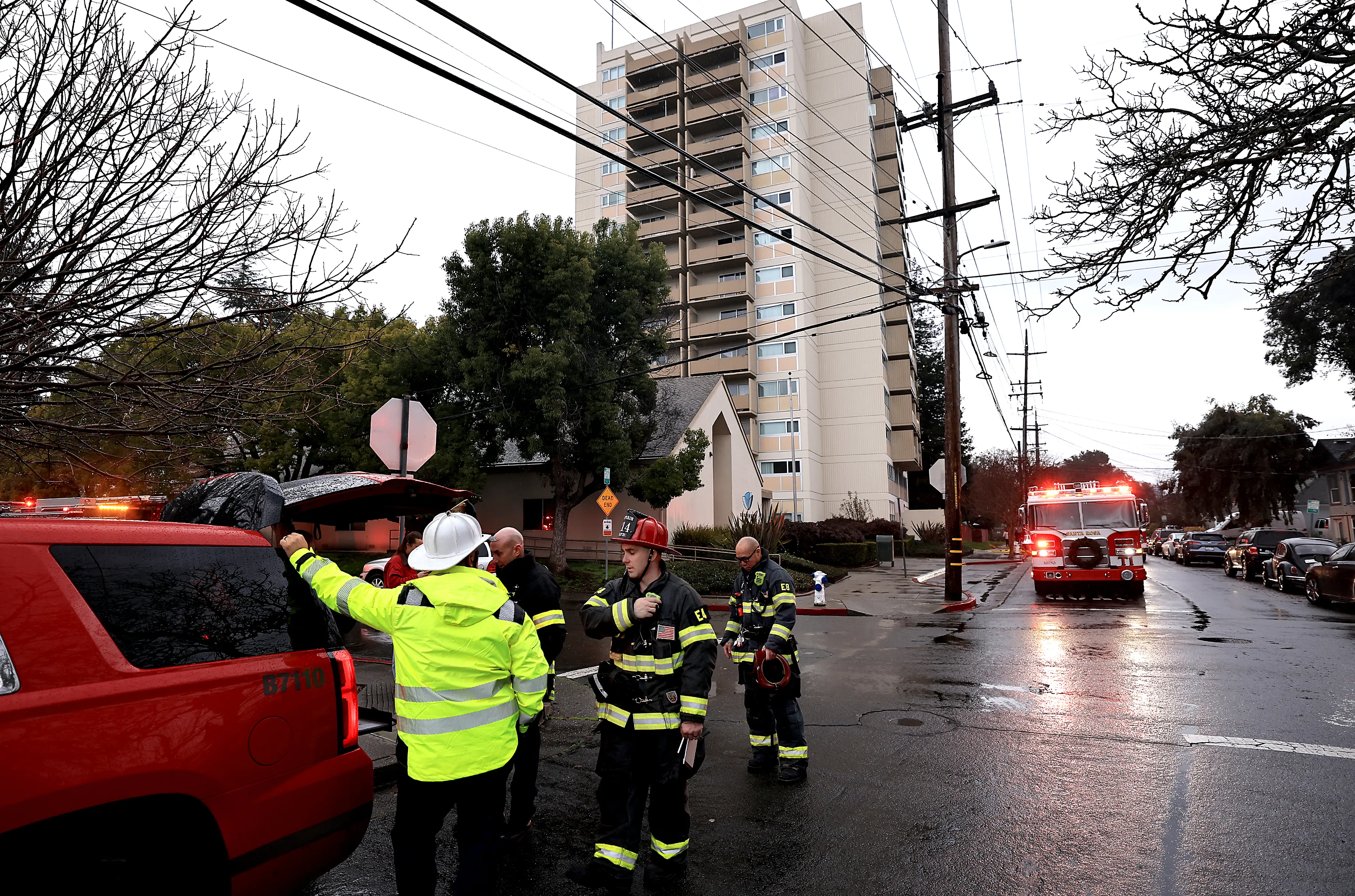 Santa Rosa firefighters gather at the Bethlehem Tower after an...