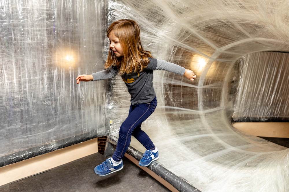 Indoor art installation TAPESCAPE is back at the Children's Museum: Kids and grownups can slide, crawl and explore.