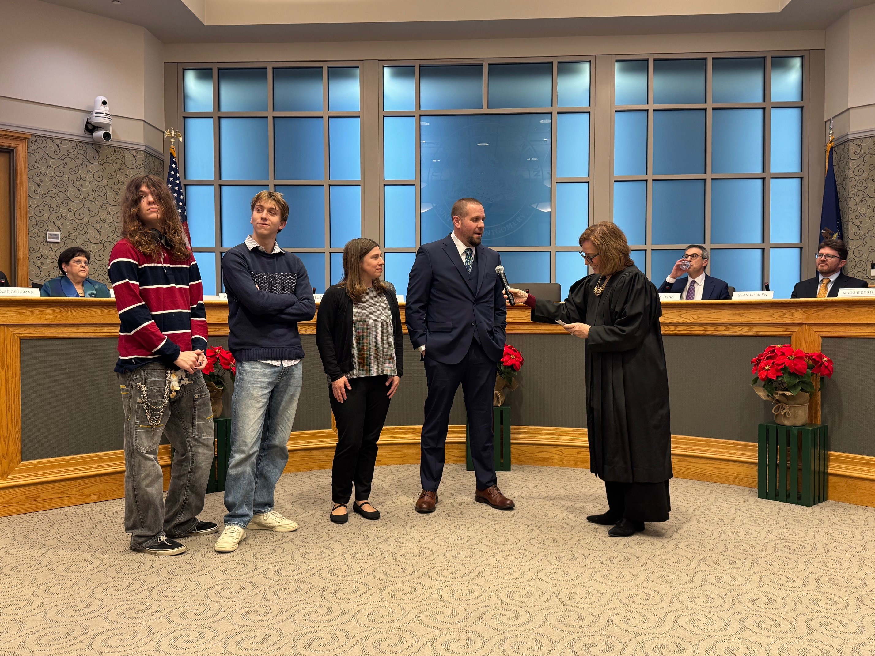 Craig Timberlake being sworn in as commissioner in Ward 8...