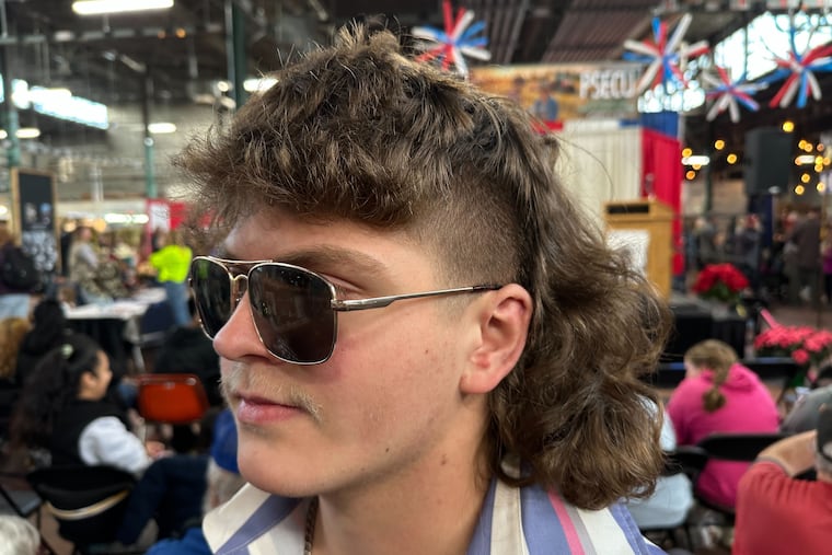 Austyn Whirt, 18, prepares for Monday's mullet hairstyle contest at the Pennsylvania Farm Show in Harrisbug.