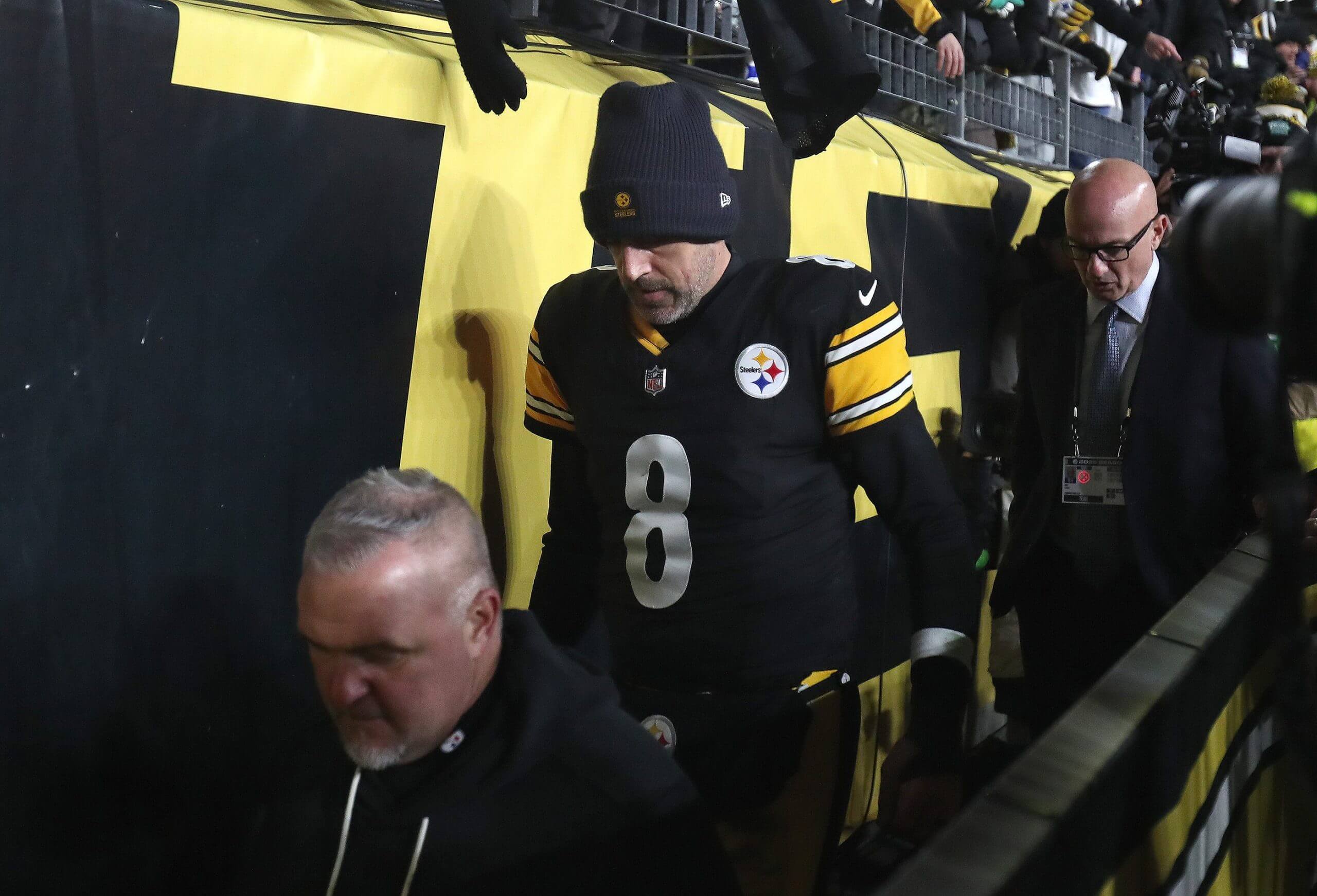 Pittsburgh Steelers quarterback Aaron Rodgers walks into the tunnel after suffering a crushing 30-6 defeat by the Houston Texans during the NFL Wild Card game at Acrisure Stadium in Pittsburgh, PA on January 12, 2026.