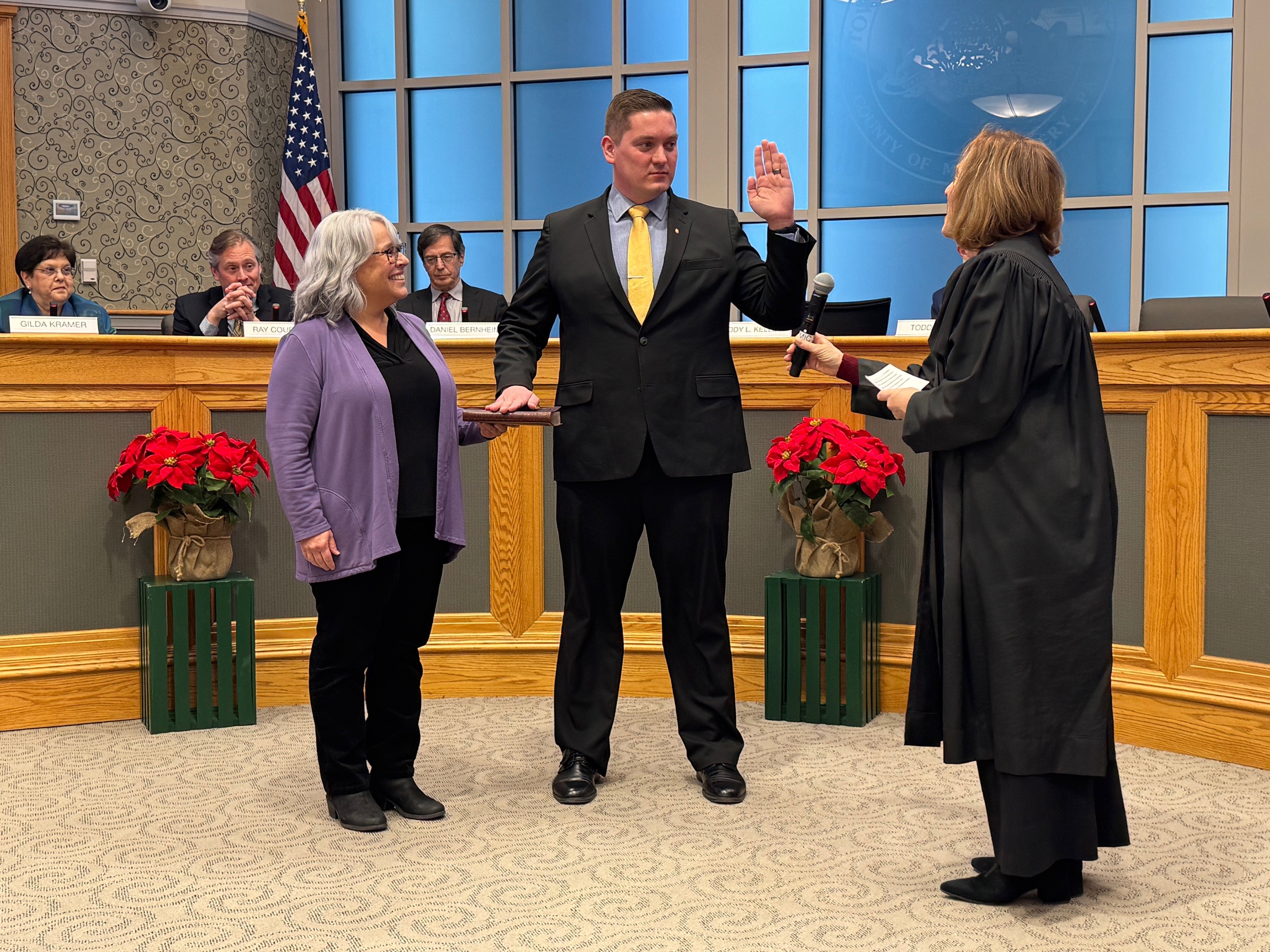 Jeremiah Woodring, commissioner in Ward 3 being sworn in as...
