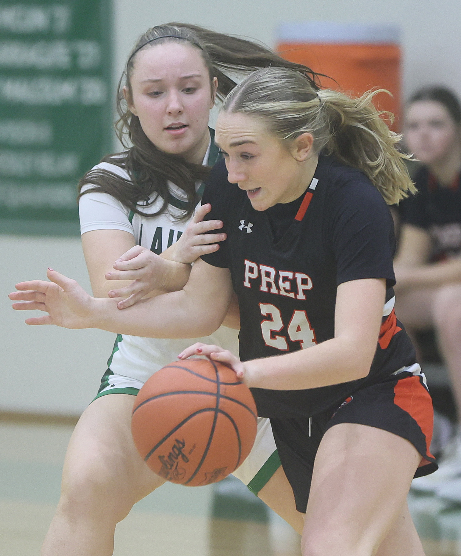 Cathedral Prep's Mia Washburn tries to get around the defense of Laurel's Jordyn Meyer in the second half. 