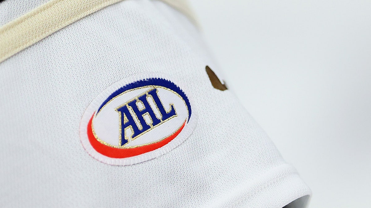 An AHL logo on a jersey