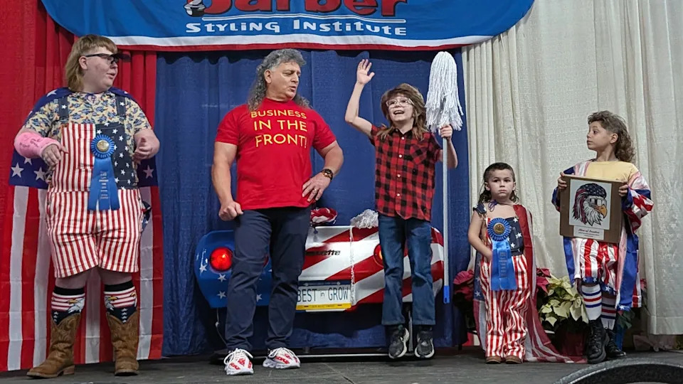 Drew Fleschut leaps off his feet when when he learns he the overall show winner. Winners of the Mullet Contest at the 2026 PA Farm Show in their age categories from the left, Alex Boose (13-18), Karl Kassees (adult), Drew Fleschut (6-12), Kieran McTear (under-5), and most patriotic Kamden Cunningham.