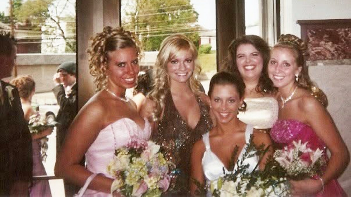 Caitlin O'Connor wearing a sparkling dress at prom.