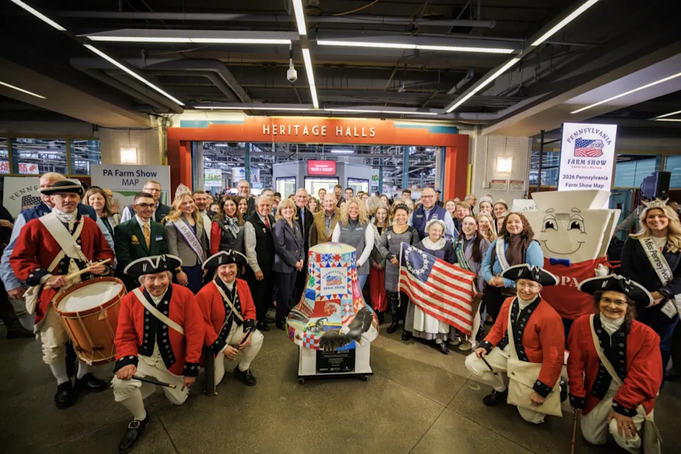 PHOTO COURTESY / COMMONWEALTH MEDIA SERVICES – Agriculture Secretary Russell Redding, Congressman Glenn GT Thompson, Executive Director of America250PA Cassandra Coleman, and a host of state and local officials, as well as current and future Pennsylvania agriculture industry leaders, cut the blue ribbon, officially opening the 2026 PA Farm Show.